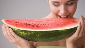 woman-eats-big-water-melon